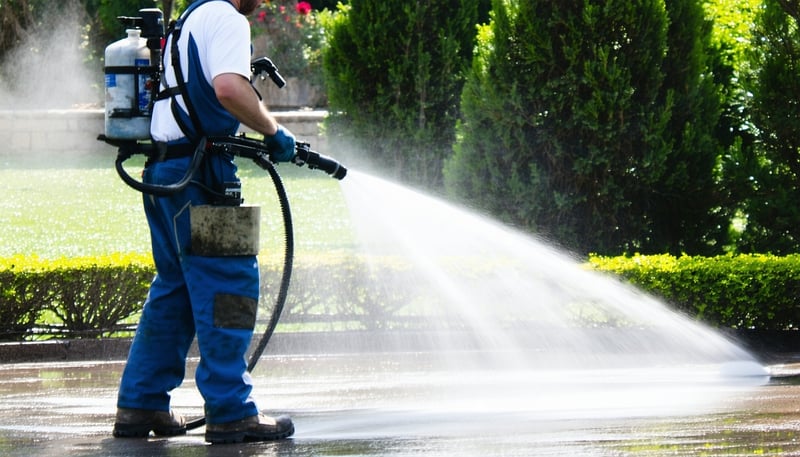Professional power washing in action Professional power washing in action